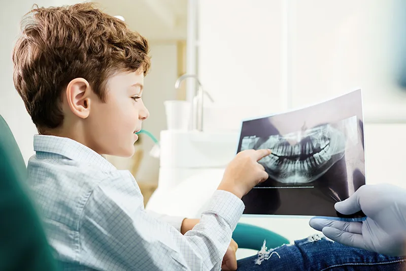 Patient reviewing digital dental records