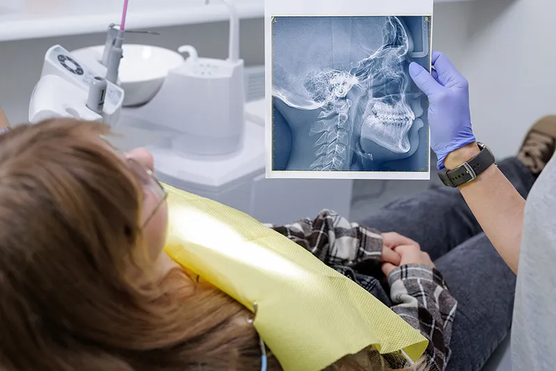 Orthodontic team reviewing a digital x-ray for treatment planning